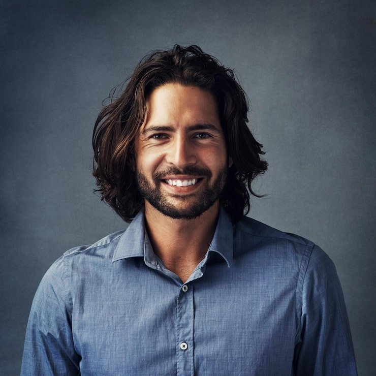 business man long hair studio portrait smile with confidence pride formal shirt by background person model happy clothes fashion style creative career barcelona 590464 431770.jpg